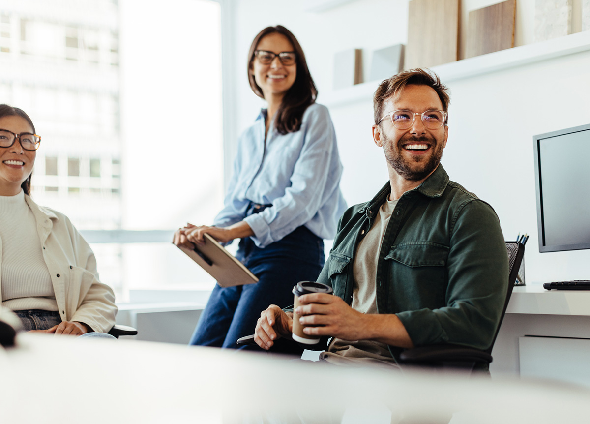 employees gathered in an office